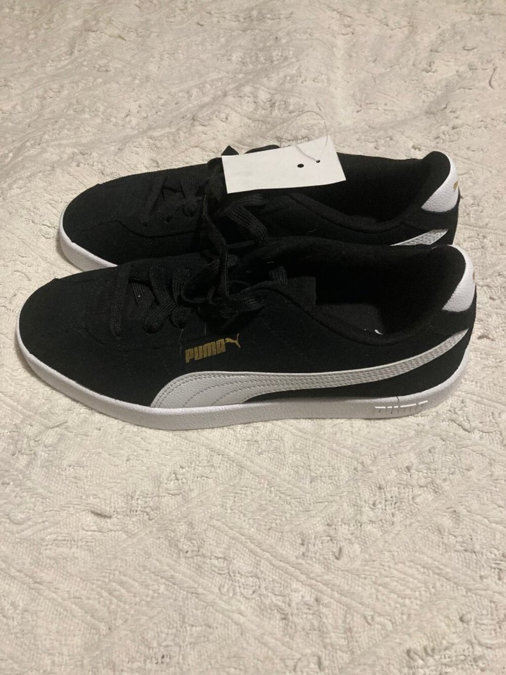 Black and gold Pumas NWT
